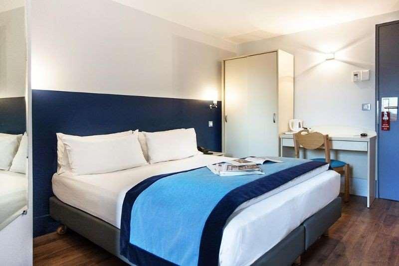Hôtel l'Amandier Nanterre Kamer foto