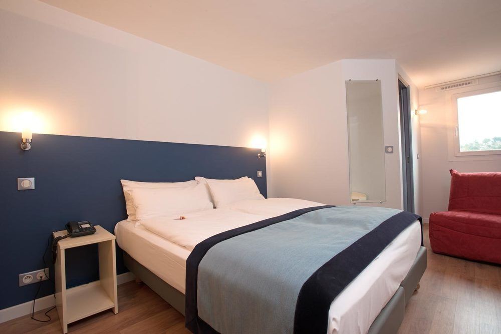 Hôtel l'Amandier Nanterre Buitenkant foto